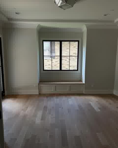 Bedroom with window seat, panel wainscoting and geometric pendant light, Clarendon Hills